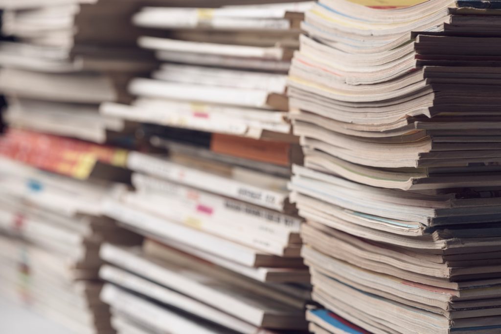 Stack of magazines and documents